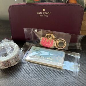 Kate spade long wallet EUC only. Keychain and stickers are no longer available.